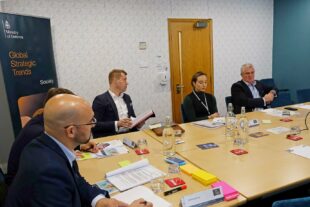A group of people at a meeting table