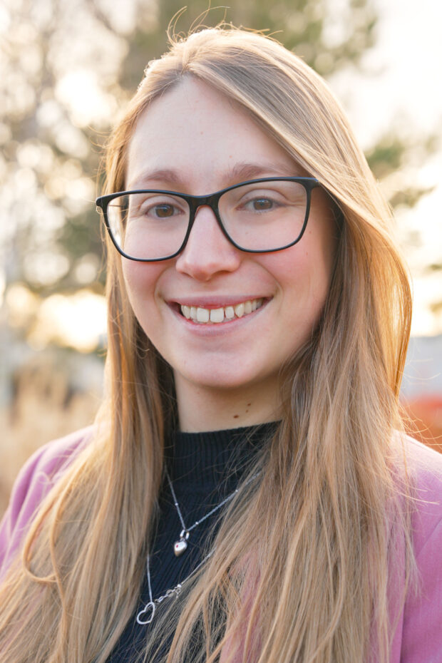 Headshot of Sophie, smiling